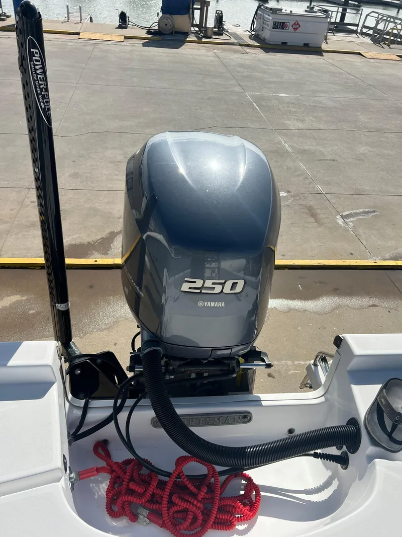 Slide: The Image of 2014 Sportsman Masters 247 Bay Boat with Yamaha 250 engine at dock. - 26