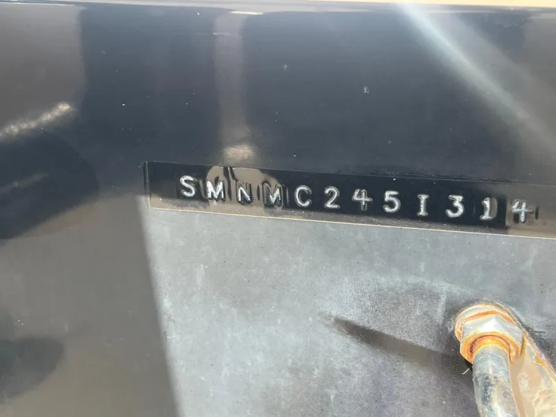 Slide: The Image of 2014 Sportsman Masters 247 Bay Boat hull identification number. - 34
