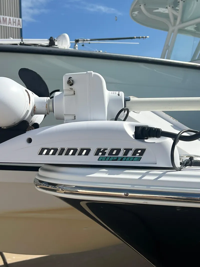 Slide: The Image of Minn Kota trolling motor on 2014 Sportsman Masters 247 Bay Boat. - 5