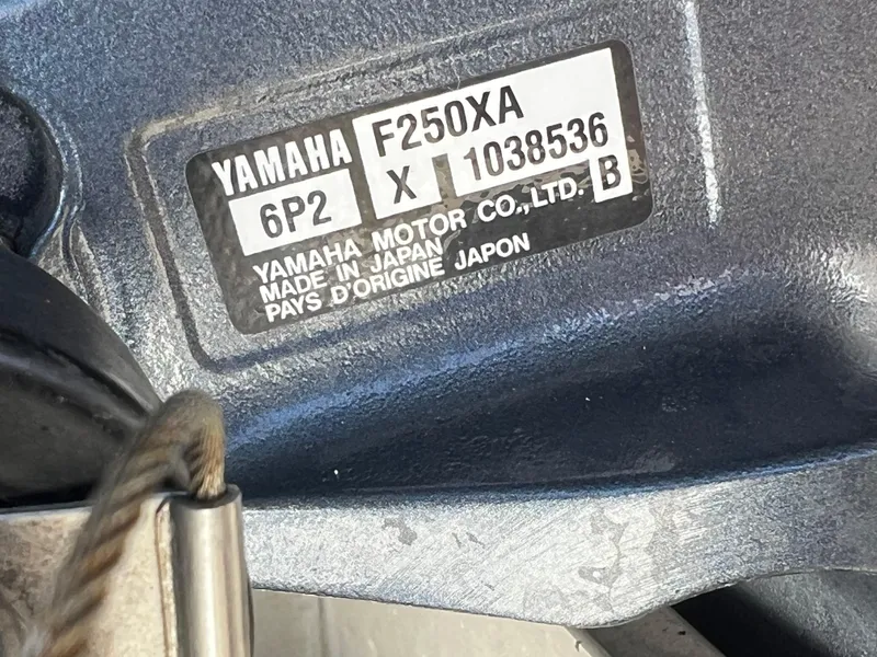 Slide: The Image of Yamaha F250XA engine label on a 2014 Sportsman Masters 247 Bay Boat. - 6