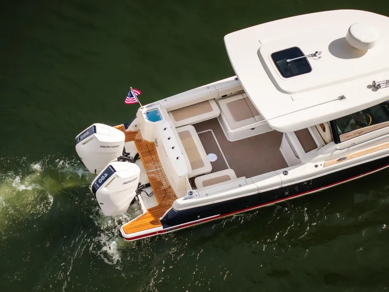 Slide: The Image of 2024 Chris-Craft Calypso 35 CP boat on water, aerial view. - 5