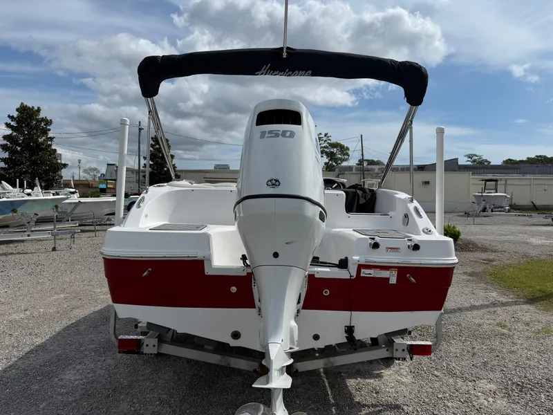 Slide: The Image of 2023 Hurricane SunDeck Sport 188 OB boat with outboard motor, rear view. - 11
