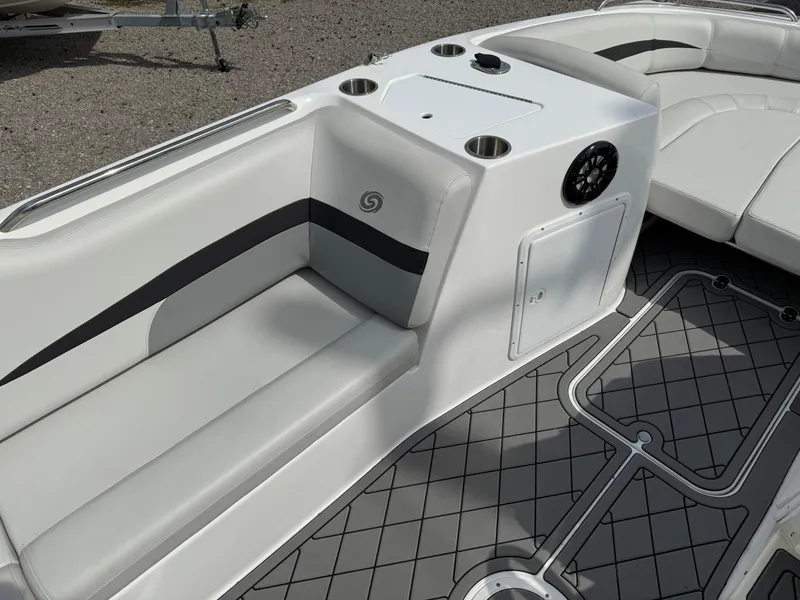 Slide: The Image of 2023 Hurricane SunDeck Sport 188 OB interior with seating and cup holders. - 21