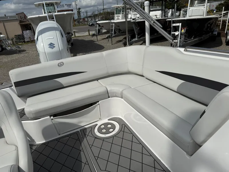 Slide: The Image of 2023 Hurricane SunDeck Sport 188 OB boat with spacious seating and modern design. - 23