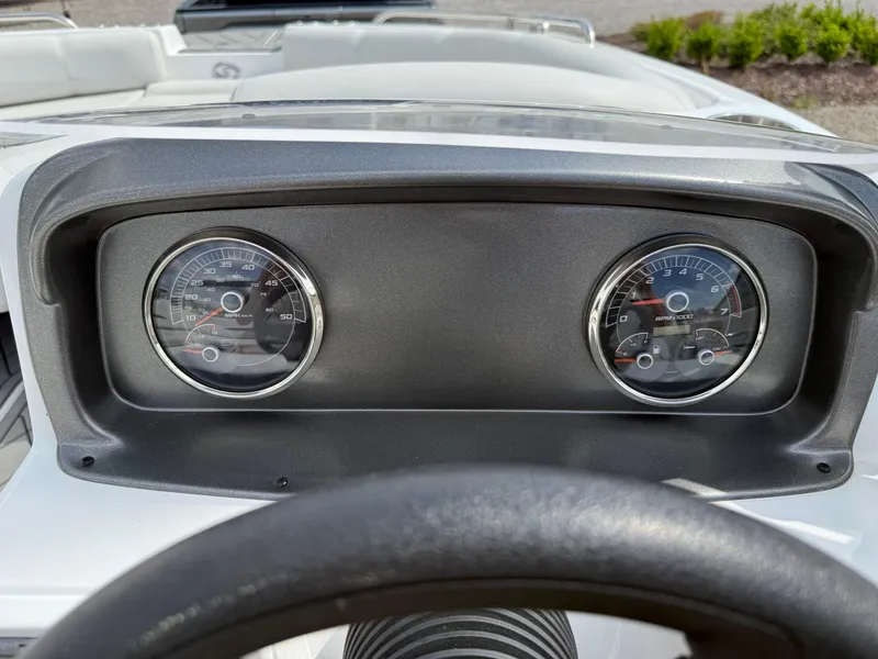 Slide: The Image of Dashboard of 2023 Hurricane SunDeck Sport 188 OB boat with dual gauges. - 27