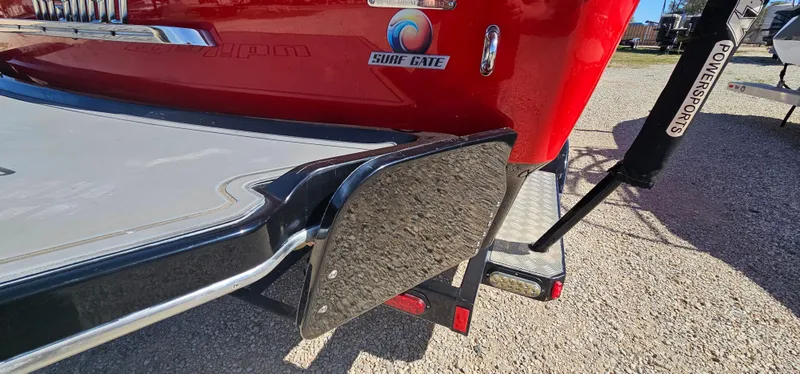 Slide: The Image of 2013 Malibu Wakesetter 23 MXZ with Surf Gate feature, rear view. - 11