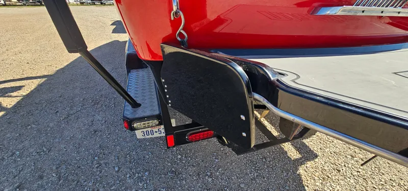 Slide: The Image of 2013 Malibu Wakesetter 23 MXZ rear view with swim platform and step ladder. - 12