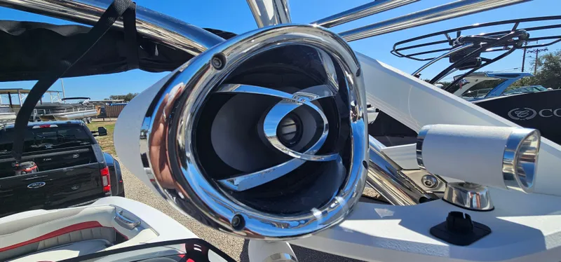 Slide: The Image of Close-up of a 2013 Malibu Wakesetter 23 MXZ boat speaker system. - 24