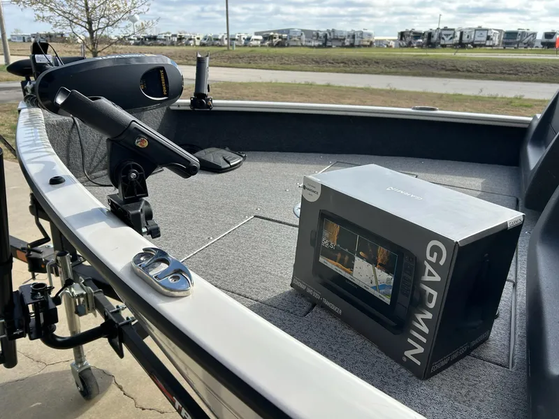 Slide: The Image of 2021 Tracker Pro Guide V 16 boat with Garmin box on deck. - 12