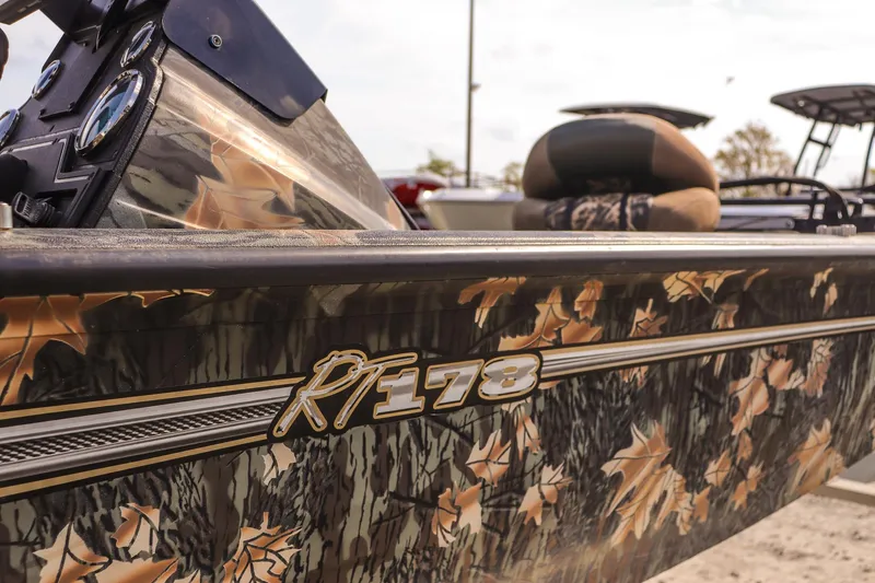 Slide: The Image of 2015 Ranger RT178 boat with camouflage design and logo detail. - 21
