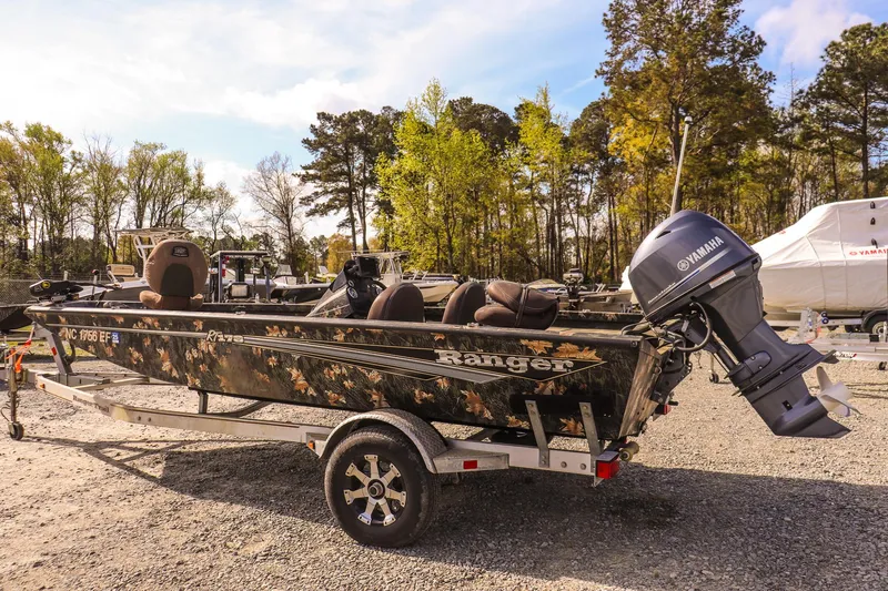 Slide: The Image of 2015 Ranger RT178 boat with Yamaha motor on trailer, parked outdoors. - 5