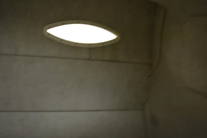 Slide: The Image of Interior cabin ceiling of 1997 Sea Ray 240 Sundancer boat. - 32