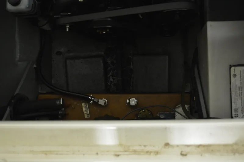 Slide: The Image of Engine compartment of a 1997 Sea Ray 240 Sundancer boat. - 35