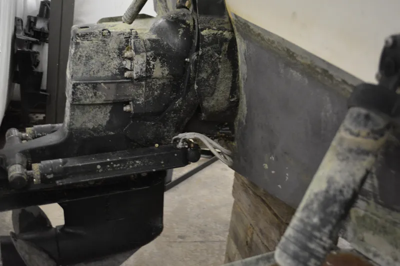 Slide: The Image of 1997 Sea Ray 240 Sundancer boat engine with visible wear and corrosion. - 39