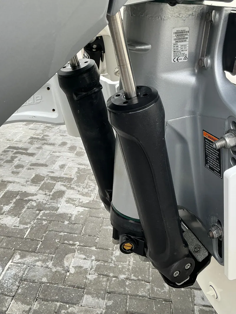 Slide: The Image of Close-up of 2023 Boston Whaler 240 Vantage boat engine components. - 13