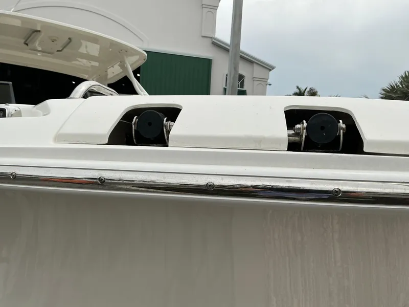 Slide: The Image of 2023 Boston Whaler 240 Vantage boat detail with stainless steel railing and fittings. - 18