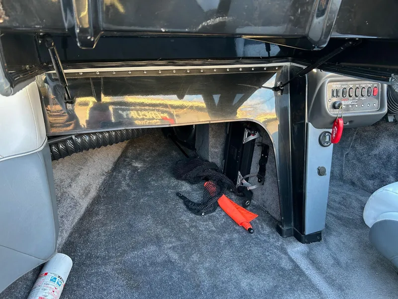 Slide: The Image of Interior of a 1999 Toyota Epic 21, featuring carpeted flooring and control panel. - 14