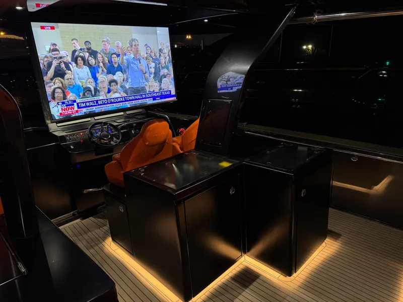 Slide: The Image of Luxurious interior of 2023 Pardo Yachts 50 with illuminated seating and large screen display. - 20