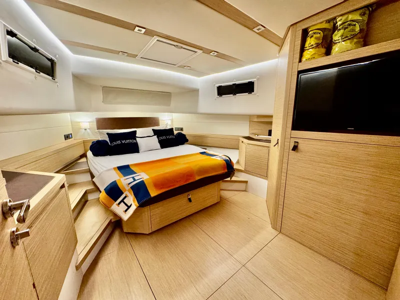 Slide: The Image of Luxurious cabin interior of 2023 Pardo Yachts 50, featuring modern design and cozy bedding. - 22