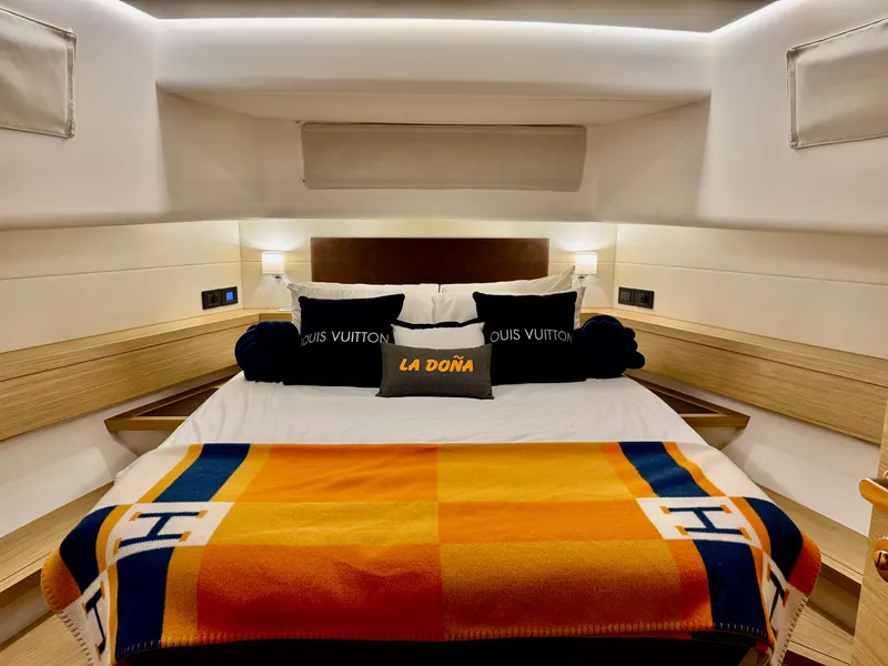 Slide: The Image of Luxurious bedroom interior of 2023 Pardo Yachts 50 with designer bedding and elegant lighting. - 23