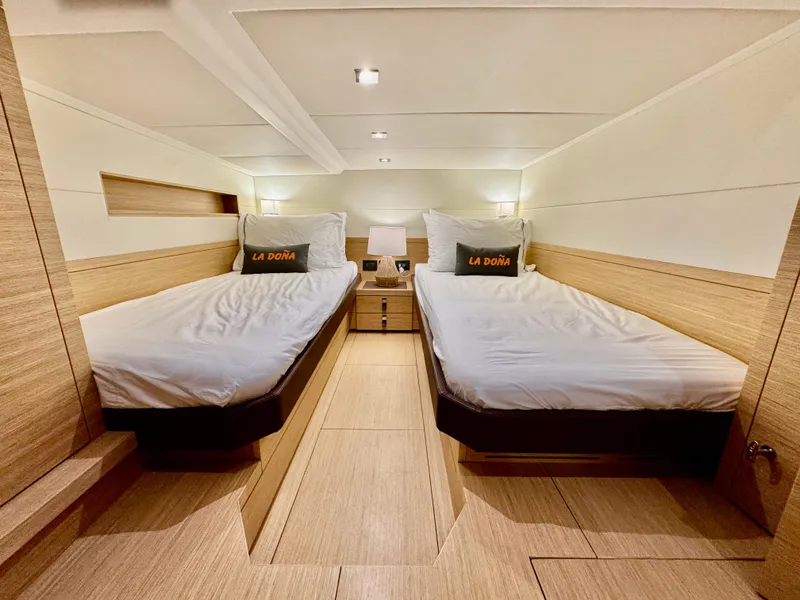Slide: The Image of Luxurious cabin interior of 2023 Pardo Yachts 50 with twin beds and modern decor. - 26