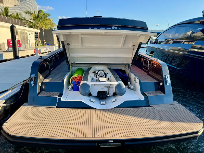 Slide: The Image of 2023 Pardo Yachts 50 with open storage compartment at marina dock. - 31