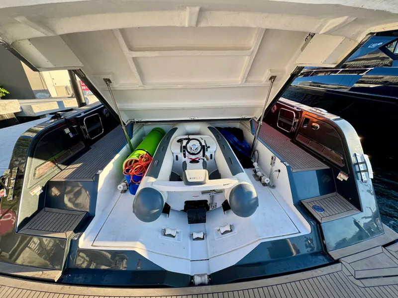 Slide: The Image of 2023 Pardo Yachts 50 with open storage compartment, showcasing interior equipment and accessories. - 32