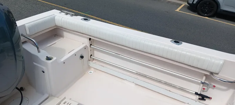 Slide: The Image of 1997 Grady-White Seafarer 226 boat interior with seating and storage compartments. - 6