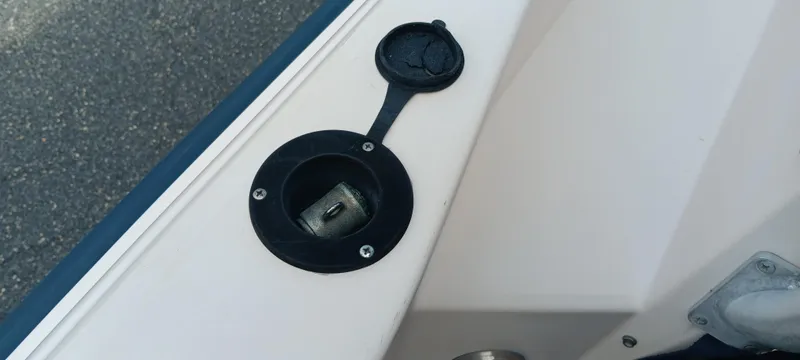 Slide: The Image of Fuel cap on a 1997 Grady-White Seafarer 226 boat deck. - 8