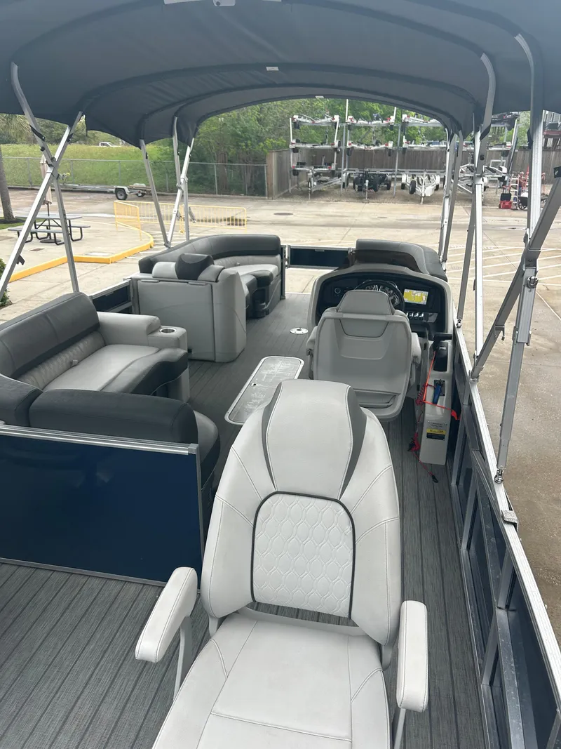 Slide: The Image of 2021 Avalon Catalina 24' pontoon boat with spacious seating and canopy. - 14