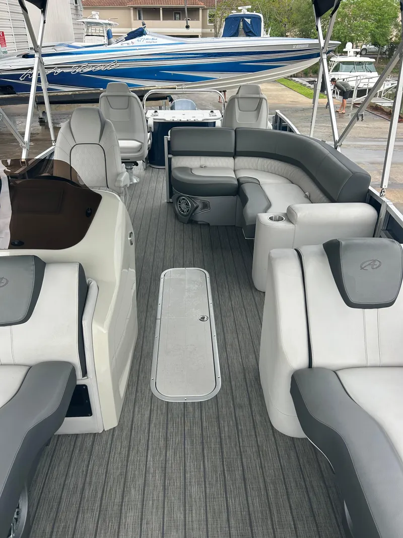Slide: The Image of 2021 Avalon Catalina 24' pontoon boat with spacious seating and modern design. - 25