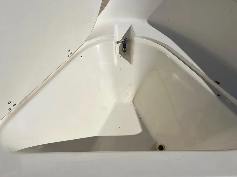 Slide: The Image of Interior view of a 1995 Boston Whaler 170 Dauntless boat compartment. - 11