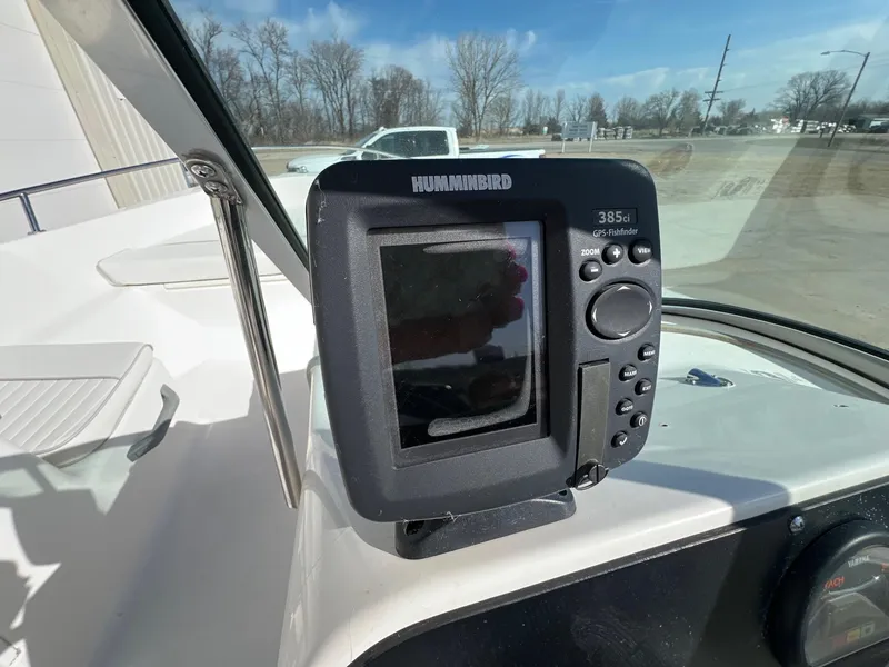 Slide: The Image of Fishfinder on 1995 Boston Whaler 170 Dauntless boat dashboard, sunny day. - 16