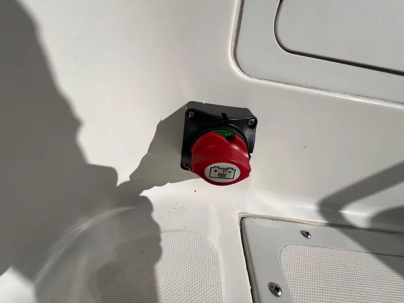 Slide: The Image of Red battery switch on a 1995 Boston Whaler 170 Dauntless boat. - 17