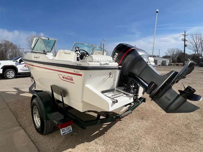 Slide: The Image of 1995 Boston Whaler 170 Dauntless boat on trailer with Yamaha outboard motor. - 5