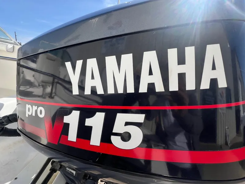 Slide: The Image of Yamaha Pro V115 outboard motor on 1995 Boston Whaler 170 Dauntless boat. - 7