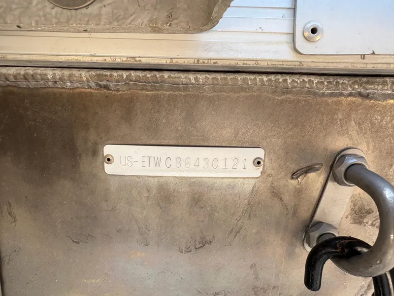 Slide: The Image of 2021 Bennington 25 QSBA IO boat hull identification number plate. - 15