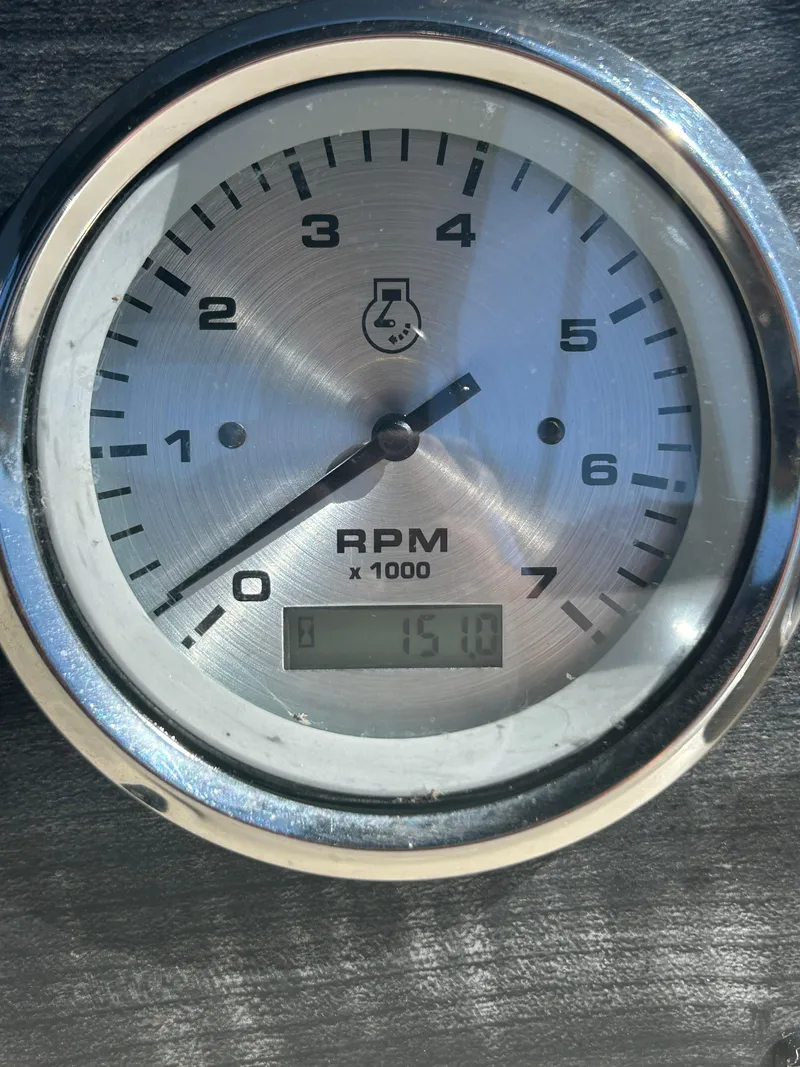 Slide: The Image of Tachometer displaying RPM on 2019 Harris Sunliner 240 boat dashboard. - 25