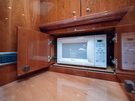 Slide: The Image of Microwave in Sunseeker Predator 55 yacht's wooden cabinet, 2007 model. - 10