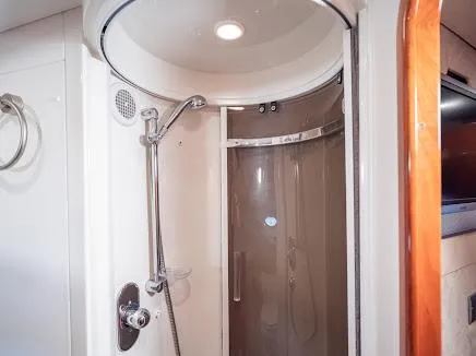 Slide: The Image of Luxurious shower area in 2007 Sunseeker Predator 55 yacht, featuring modern fixtures and elegant design. - 11