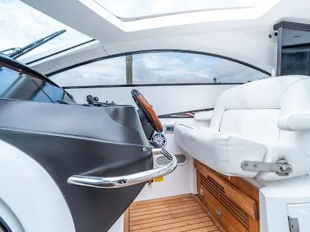 Slide: The Image of Interior of 2007 Sunseeker Predator 55 yacht with sleek design and luxurious seating. - 19