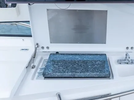 Slide: The Image of Outdoor kitchen area on a 2007 Sunseeker Predator 55 yacht. - 23