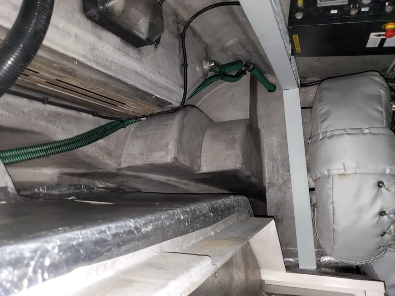 Slide: The Image of Engine compartment of a 2007 Sunseeker Predator 55 yacht, showing mechanical components. - 44