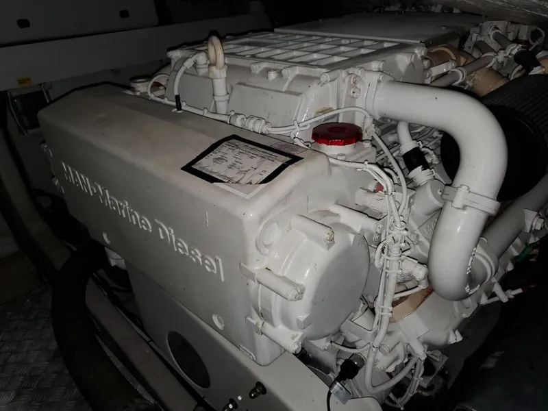 Slide: The Image of Engine of a 2007 Sunseeker Predator 55 yacht, showcasing detailed mechanical components. - 48