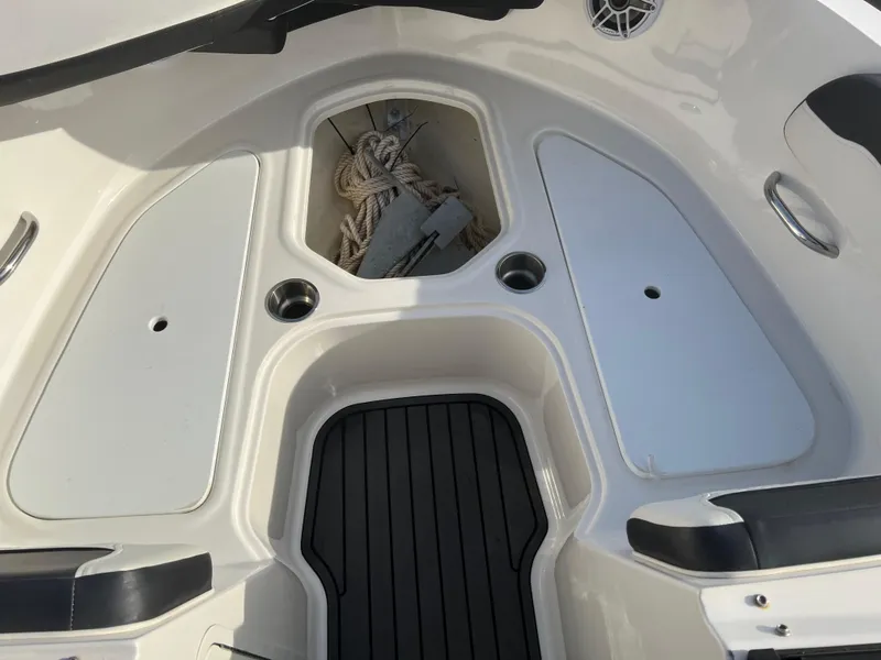 Slide: The Image of 2021 Bayliner VR5 Bowrider I/O boat interior with storage compartments and anchor. - 13