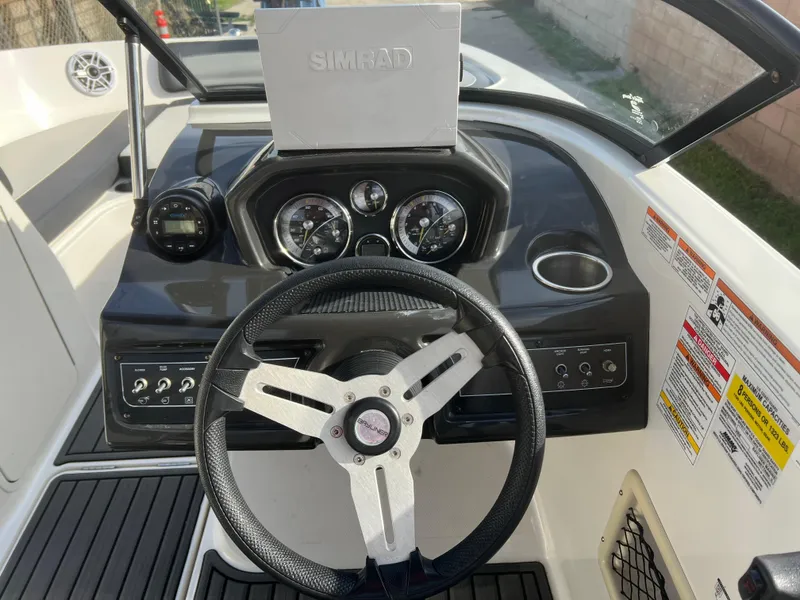 Slide: The Image of 2021 Bayliner VR5 Bowrider I/O dashboard with steering wheel and instrument panel. - 15