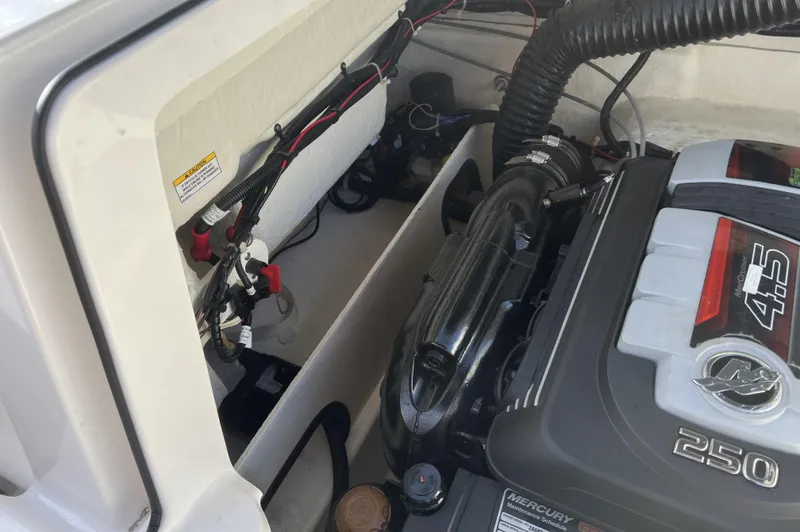 Slide: The Image of Engine compartment of 2021 Bayliner VR5 Bowrider I/O with Mercury 250 horsepower engine. - 21