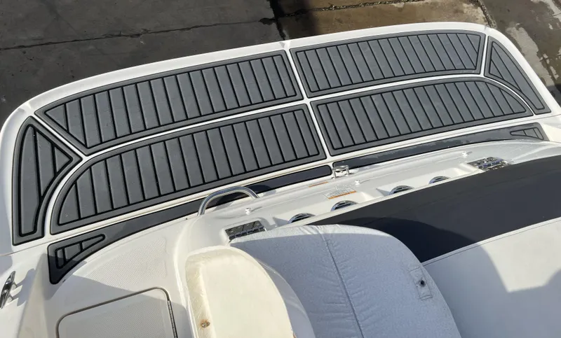 Slide: The Image of 2021 Bayliner VR5 Bowrider I/O boat deck with sleek, modern design and comfortable seating. - 22