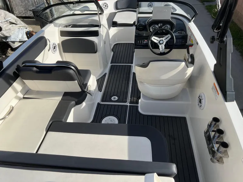 Slide: The Image of 2021 Bayliner VR5 Bowrider I/O interior with sleek seating and modern dashboard. - 9