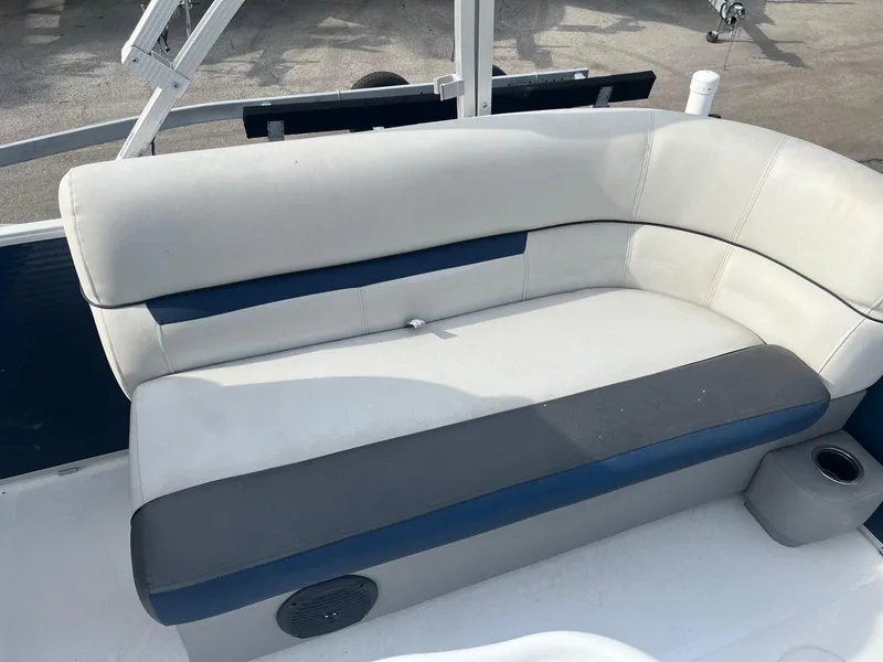 Slide: The Image of 2021 Hurricane FunDeck 236SB OB boat seating with gray and blue cushioned bench. - 11